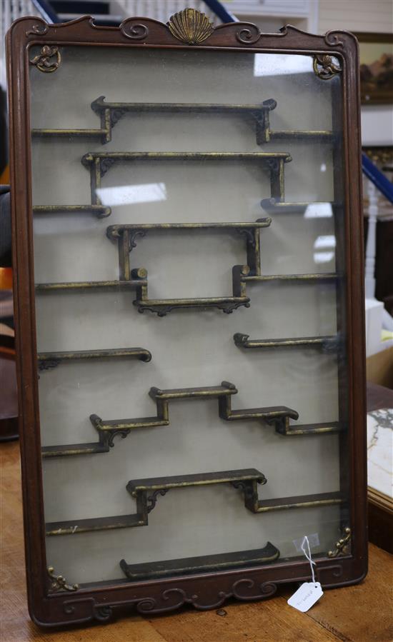 A Chinese hongmu snuff bottle cabinet W.52cm